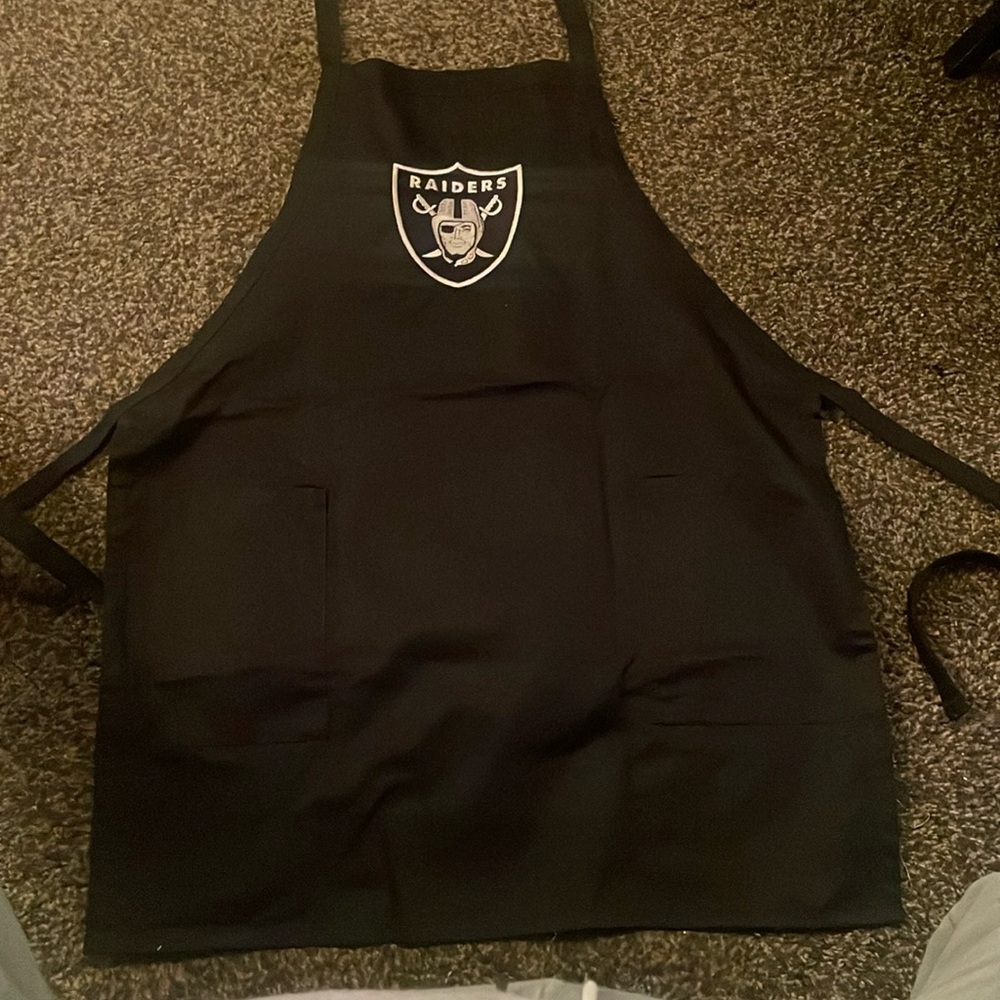 Brand new Raiders embroidered black apron